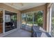 This screened patio provides backyard access, enhancing the indoor-outdoor flow and creating a seamless transition at 815 Greenview Dr, Apollo Beach, FL 33572