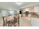 Bright kitchen area with stainless steel appliances and seamlessly connected with the dining area at 8321 43Rd Ave W, Bradenton, FL 34209