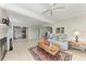 Comfortable living room featuring tile floors, sliding glass doors and a cozy seating area at 8321 43Rd Ave W, Bradenton, FL 34209
