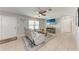 Living room with neutral tile floors, modern furniture, and bright, natural light at 8321 43Rd Ave W, Bradenton, FL 34209