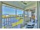 Spacious screened-in balcony offering beautiful water views at 840 Audubon Dr, Bradenton, FL 34209