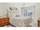 Comfortable bedroom with bright light and coastal decor at 840 Audubon Dr, Bradenton, FL 34209
