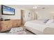 Cozy bedroom featuring a TV, dresser, and decorative seahorse accent at 840 Audubon Dr, Bradenton, FL 34209