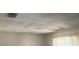 Close-up of a stained ceiling with damaged plaster, revealing areas needing repair at 8409 Trionfo Ave, North Port, FL 34287
