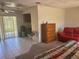 Cozy living room including a tile floor, sofa, and dining area; ideal for relaxation and entertaining at 8409 Trionfo Ave, North Port, FL 34287