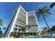 High-rise condo with pool and palm trees at 1 Benjamin Franklin Dr # 93, Sarasota, FL 34236