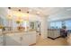 Stylish kitchen showcasing granite countertops, modern appliances, and open layout at 1 Benjamin Franklin Dr # 93, Sarasota, FL 34236
