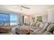 Cozy living room with plush seating and a balcony overlooking the beautiful ocean view at 1 Benjamin Franklin Dr # 93, Sarasota, FL 34236