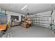 Spacious garage with epoxy flooring, storage, and ample room for parking at 10177 Crystal Isle Cir, Sarasota, FL 34241