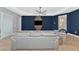 Stylish living room featuring ceiling fan, contemporary design and tile flooring at 10177 Crystal Isle Cir, Sarasota, FL 34241