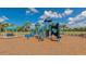 Fun playground featuring slides, climbing structures, and shade canopies, perfect for outdoor activities at 10177 Crystal Isle Cir, Sarasota, FL 34241