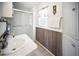 Bathroom has a shower with glass doors and a white vanity at 10315 Cortez W Rd # 60-4, Bradenton, FL 34210