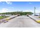 Scenic boat ramp offering convenient water access and picturesque waterfront views on a sunny day with clear blue skies at 10315 Cortez W Rd # 60-4, Bradenton, FL 34210