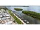 Aerial shot of community marina with docks, boat slips, and waterfront access for residents to enjoy boating and water activities at 10315 Cortez W Rd # 60-4, Bradenton, FL 34210