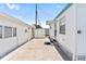 View of the mobile home's exterior, showcasing the storage shed, parking space, and well-kept surroundings at 10315 Cortez W Rd # 60-4, Bradenton, FL 34210
