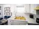 Eat-in kitchen features a window and a yellow sink at 10315 Cortez W Rd # 60-4, Bradenton, FL 34210