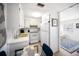 Bright kitchen features white appliances, white cabinets, and a yellow sink at 10315 Cortez W Rd # 60-4, Bradenton, FL 34210