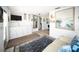 Bright living space with built-in cabinets, a large mirror, and comfortable seating arrangement at 10315 Cortez W Rd # 60-4, Bradenton, FL 34210