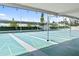 A shaded shuffleboard court with seating at 10315 Cortez W Rd # 60-4, Bradenton, FL 34210
