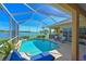 Enjoy the sunshine and scenic views from this private screened pool and lanai, perfect for relaxation and outdoor fun at 10571 Old Grove Cir, Bradenton, FL 34212