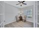Office space with neutral walls, white trim, and shuttered window for natural light at 11250 Rivers Bluff Cir, Lakewood Ranch, FL 34202