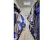 Well-organized walk-in closet offering ample storage with racks and shelves on both sides at 11250 Rivers Bluff Cir, Lakewood Ranch, FL 34202