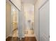 Hallway leading to dual vanity bathroom at 150 L Pavia Blvd # 13, Venice, FL 34292