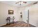 Hallway leading to other rooms in the home featuring an arched doorway at 150 L Pavia Blvd # 13, Venice, FL 34292