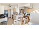 Bright kitchen island area open to living room at 150 L Pavia Blvd # 13, Venice, FL 34292