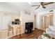Stylish living area with open kitchen view, blending comfort and functionality for modern living at 150 L Pavia Blvd # 13, Venice, FL 34292