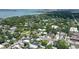 This aerial view showcases a property nestled in a lush neighborhood at 1738 Siesta Dr, Sarasota, FL 34239