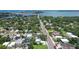 Beautiful aerial view of charming property and lush green surroundings in a coastal neighborhood at 1738 Siesta Dr, Sarasota, FL 34239