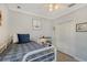 Well-lit bedroom with a comfortable bed, neutral tones, and ample closet space, offering a serene and inviting retreat at 1738 Siesta Dr, Sarasota, FL 34239