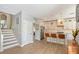 Bright kitchen with a white island, pendant lighting and stainless steel appliances at 1738 Siesta Dr, Sarasota, FL 34239