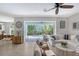 Comfortable living space with a seamless indoor-outdoor flow to the backyard pool and patio area at 1738 Siesta Dr, Sarasota, FL 34239