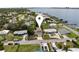 Aerial view showcasing the location of a single-Gathering home near the water and other residential properties at 204 21St Ne St, Bradenton, FL 34208