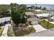 Aerial view of the home, showcasing its prime location and well-manicured lawn at 204 21St Ne St, Bradenton, FL 34208