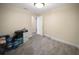 Unfurnished room with light gray flooring, neutral walls, and a ceiling light at 204 21St Ne St, Bradenton, FL 34208