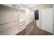 Spacious walk-in closet with custom shelving and natural light, offering ample storage and organization at 204 21St Ne St, Bradenton, FL 34208