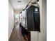 Well-organized walk-in closet with hanging storage and access to the main bedroom at 204 21St Ne St, Bradenton, FL 34208
