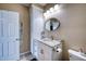 Bathroom features a granite countertop vanity, ample storage, and a convenient layout for optimal functionality at 210 3Rd W St # 8308, Bradenton, FL 34205