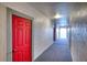 Apartment hallway leading to outdoor balcony overlooking a water view at 210 3Rd W St # 8308, Bradenton, FL 34205