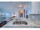 Beautiful kitchen with granite countertops that open to living space at 210 3Rd W St # 8308, Bradenton, FL 34205