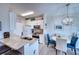 Bright kitchen with granite countertops, stainless steel appliances, and a cozy breakfast nook for casual dining and entertaining at 210 3Rd W St # 8308, Bradenton, FL 34205