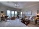Inviting living room with water views, stylish furniture, and abundant natural light at 210 3Rd W St # 8308, Bradenton, FL 34205