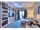 Inviting living room with custom built-ins, comfortable seating, and relaxing ambiance at 210 3Rd W St # 8308, Bradenton, FL 34205
