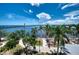 Expansive water view with palm trees, bridge and park; showcasing the area's natural beauty and recreational options at 210 3Rd W St # 8308, Bradenton, FL 34205