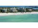 Aerial view of beachfront resort property with white sand beach at 225 Sands Point Rd # 6201, Longboat Key, FL 34228