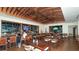 Upscale bar with a wide selection of beverages, wooden accents, and comfortable seating at 225 Sands Point Rd # 6201, Longboat Key, FL 34228