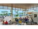 Outdoor dining area with ocean views and ample seating at 225 Sands Point Rd # 6201, Longboat Key, FL 34228